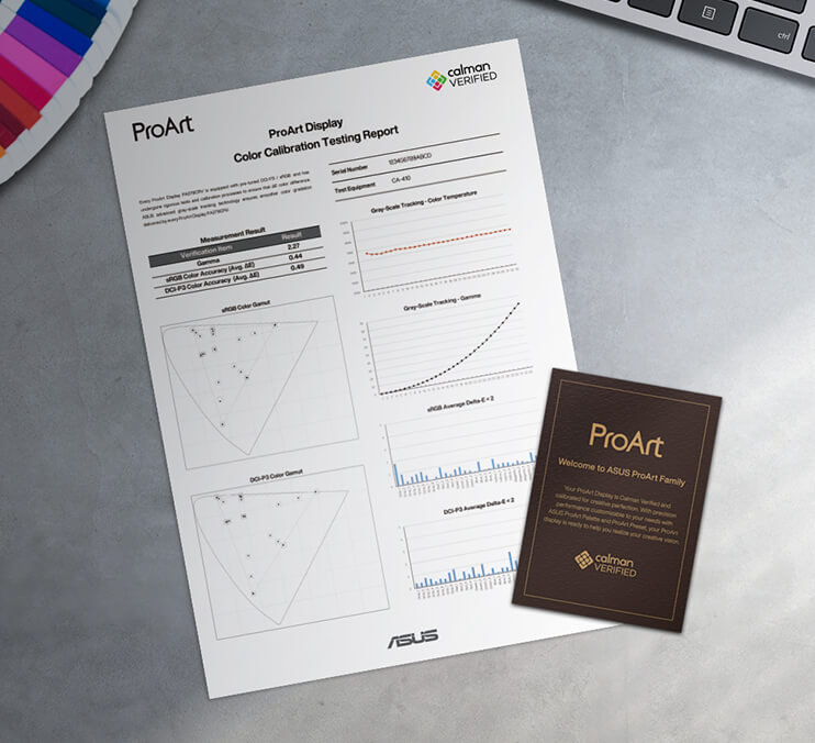 A color calibration test report of ProArt Display lies on a creator’s desk