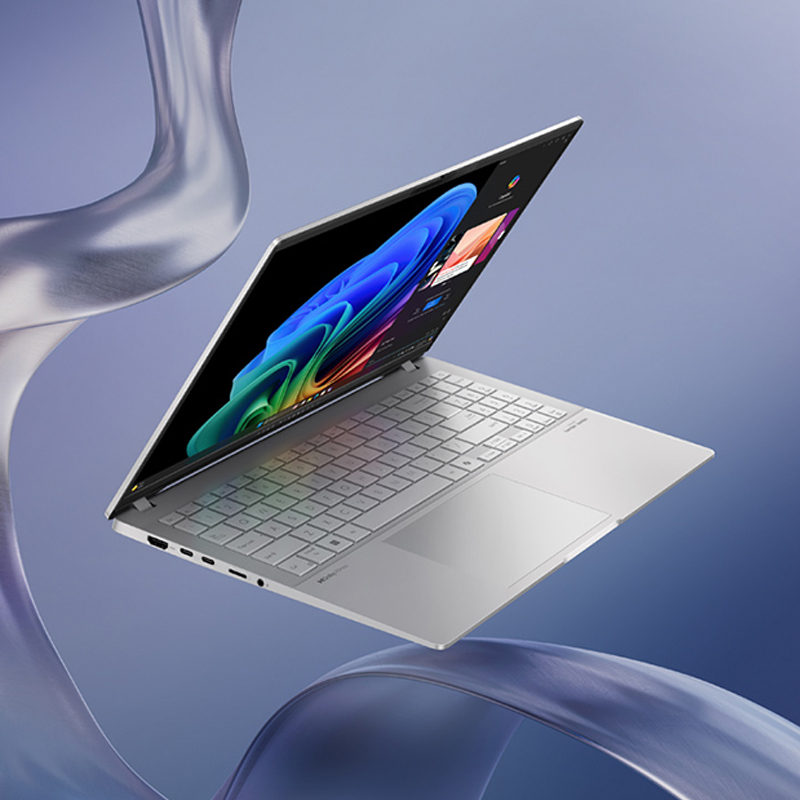 ASUS Vivobook S 15 laptop with an open screen floating in the air with a blue abstract ribbon in the background