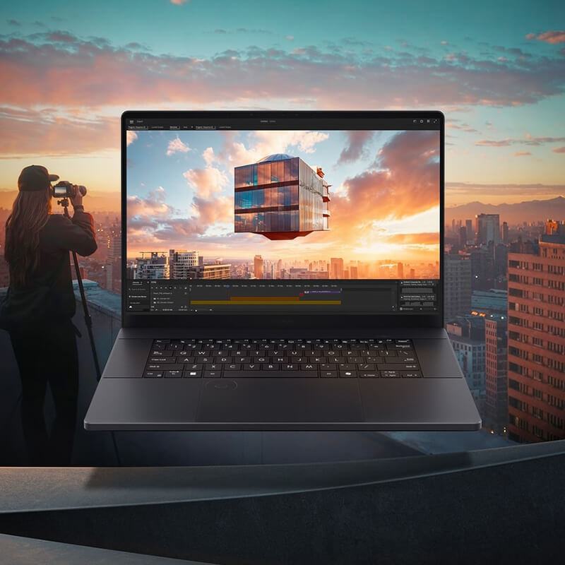 A ProArt P16 laptop with video-editing software displayed onscreen floats in front of a background image of a city during sunset.