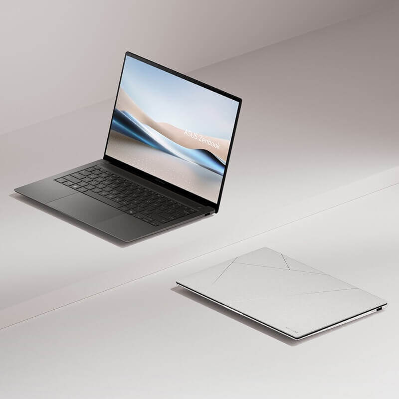 A gray Zenbook is open and slightly facing the left with an aesthetic image on display.