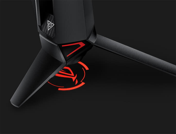 Product photo showing the projected ROG logo on the underside of the monitor stand.