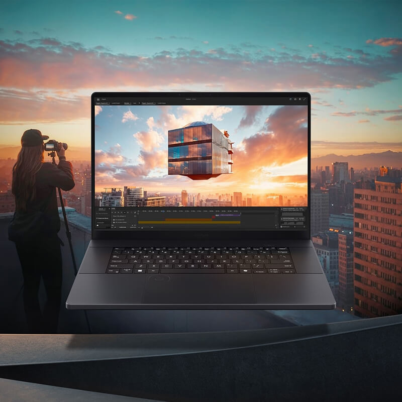 A ProArt P16 laptop with video-editing software displayed onscreen floats in front of a background image of a city during sunset.